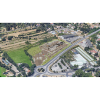 Vue aérienne d'une zone commerciale avec l'insertion paysagère du projet de concessions automobiles et de son parking 
